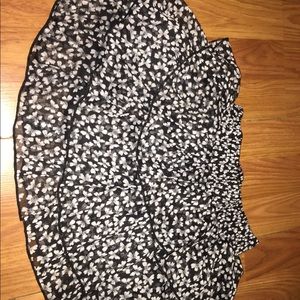 It’s a black and white butterfly skirt for girls